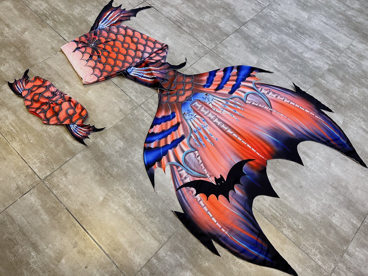 بدلة سباحة أصلية للرجال والنسا - مراجعة Aquarium & Marine Science Center وسعره